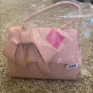 Gunas pink cottontail purse